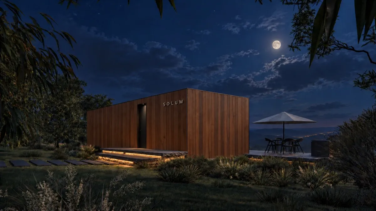 SOLUM Max in Amber: the entrance, across the grass to the hills, after dark