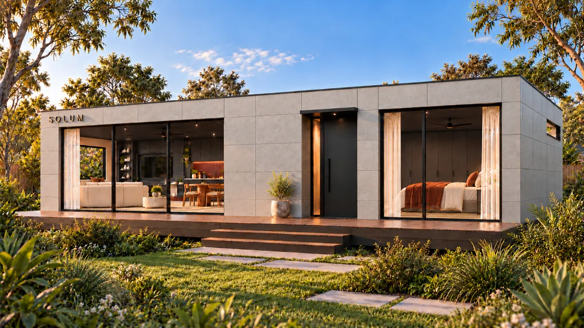 SOLUM Plus in Ivory: the long side, the deck and the entry, in late afternoon light