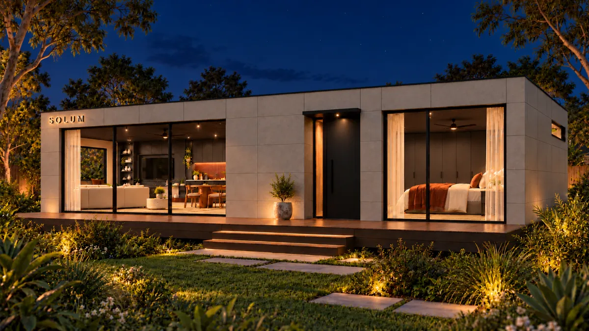 SOLUM Plus in Ivory: the long side, the deck and the entry, after dark