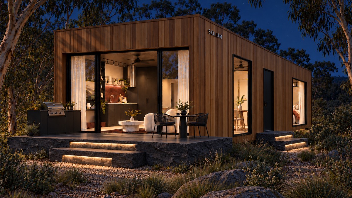 SOLUM Studio in Amber: the open front, over its stone terrace, after dark