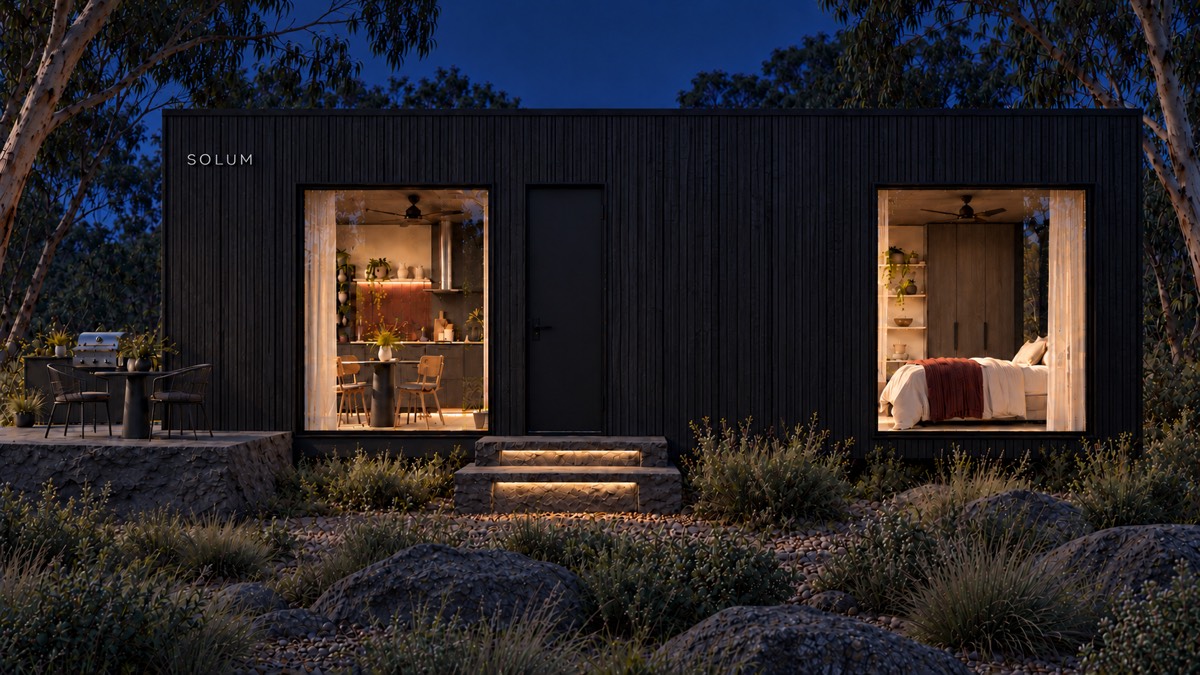 SOLUM Studio in Char: the long side, through gum trees, after dark