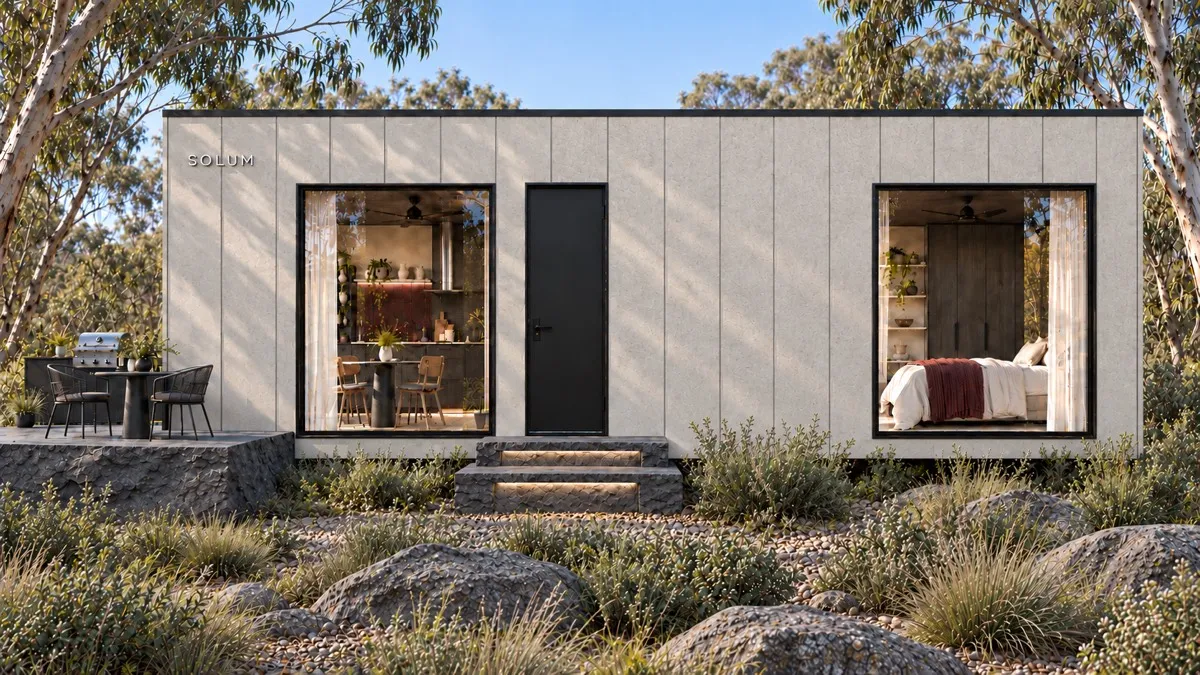 SOLUM Studio in Ivory: the long side, through gum trees, in morning light
