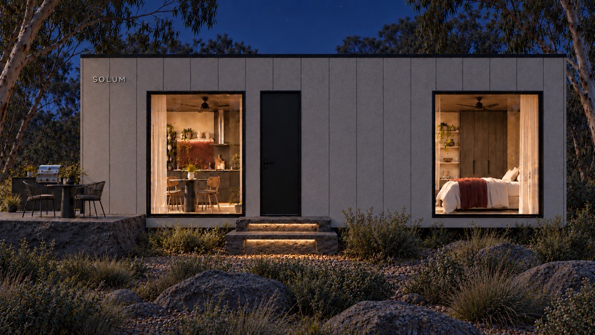 SOLUM Studio in Ivory: the long side, through gum trees, after dark