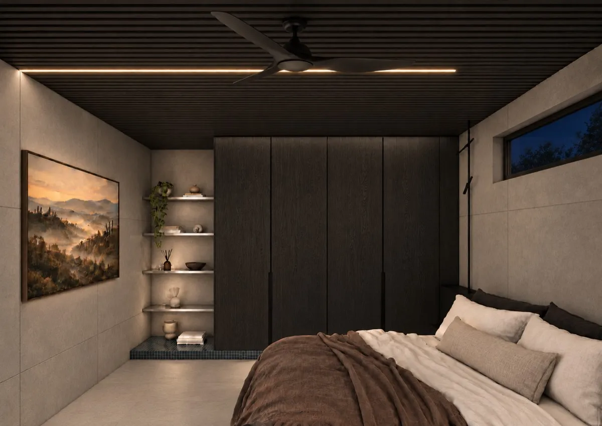 The bedroom of SOLUM Max in Tide, with dark oak joinery, after dark