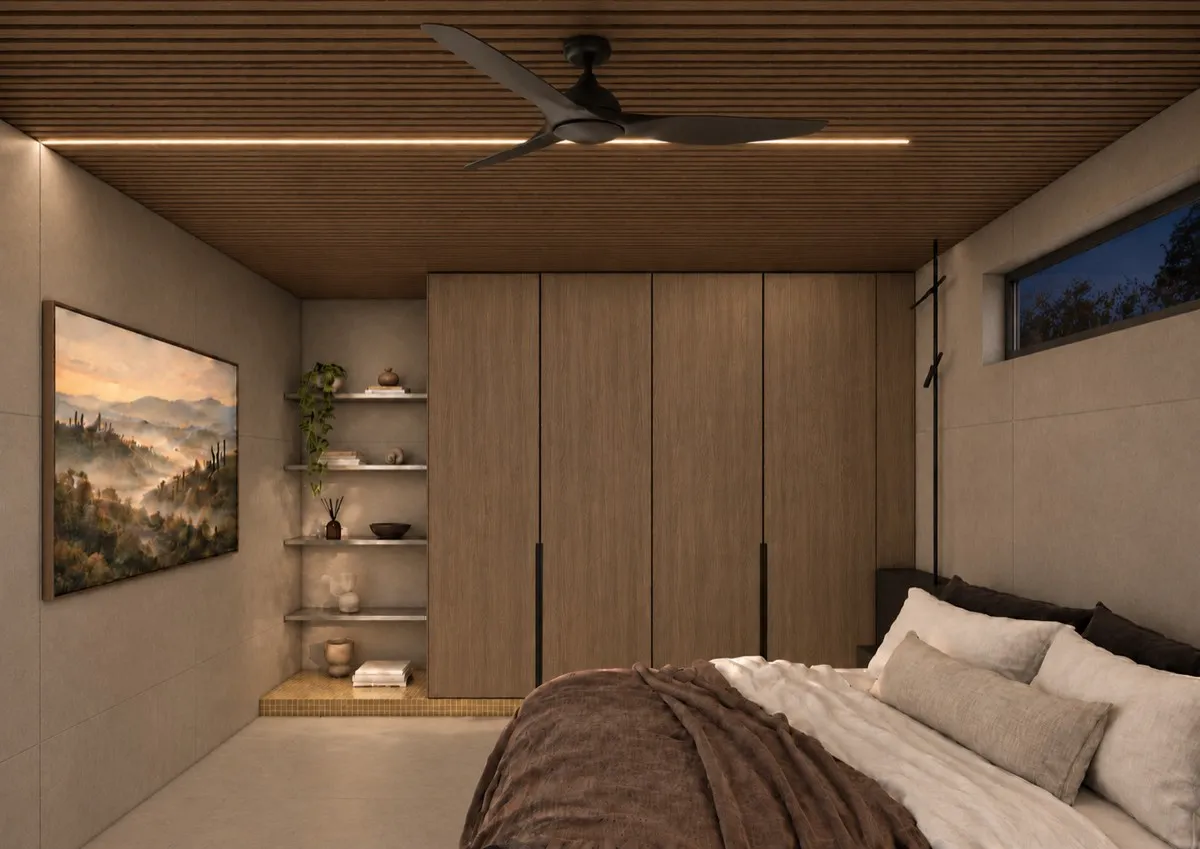 The bedroom of SOLUM Max in Vine, with raw walnut joinery, after dark