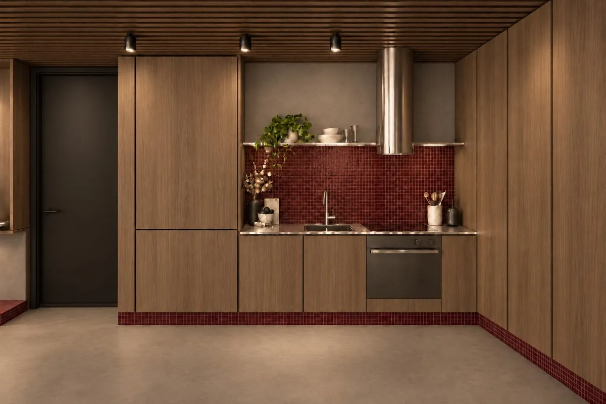 The kitchen of SOLUM Max in Burgundy, with raw walnut joinery, after dark
