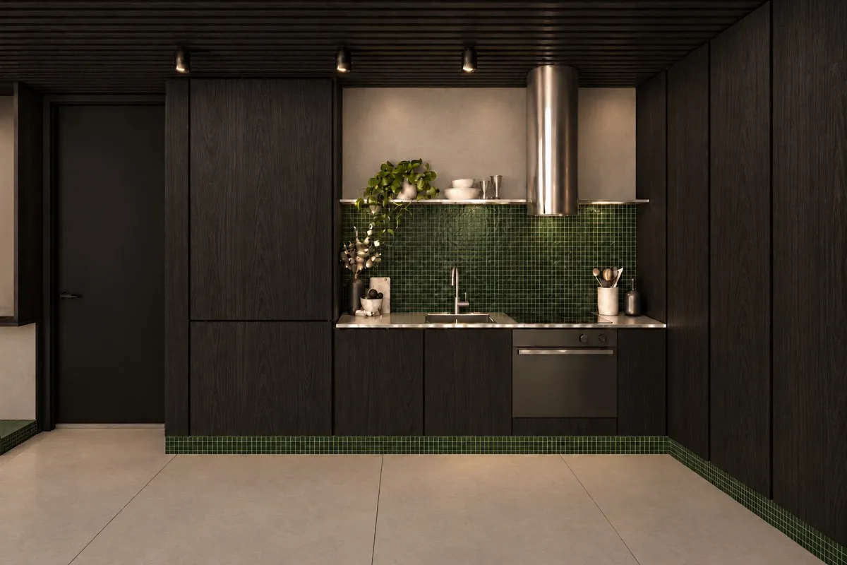 The kitchen of SOLUM Max in Sage, with dark oak joinery, after dark