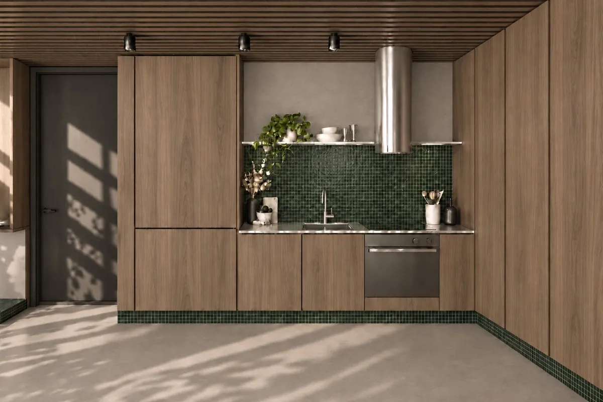 The kitchen of SOLUM Max in Sage, with raw walnut joinery