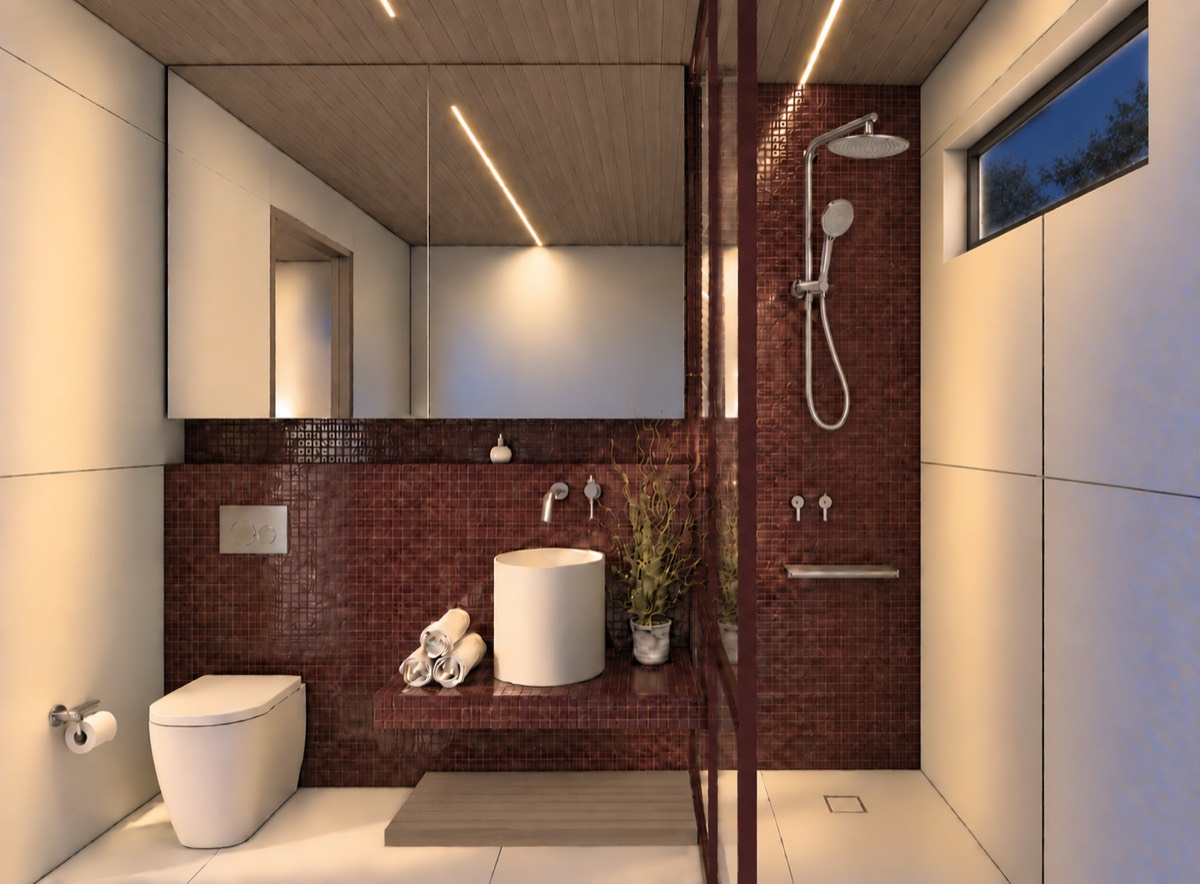 The bathroom of SOLUM Plus in Burgundy, with raw walnut joinery, after dark
