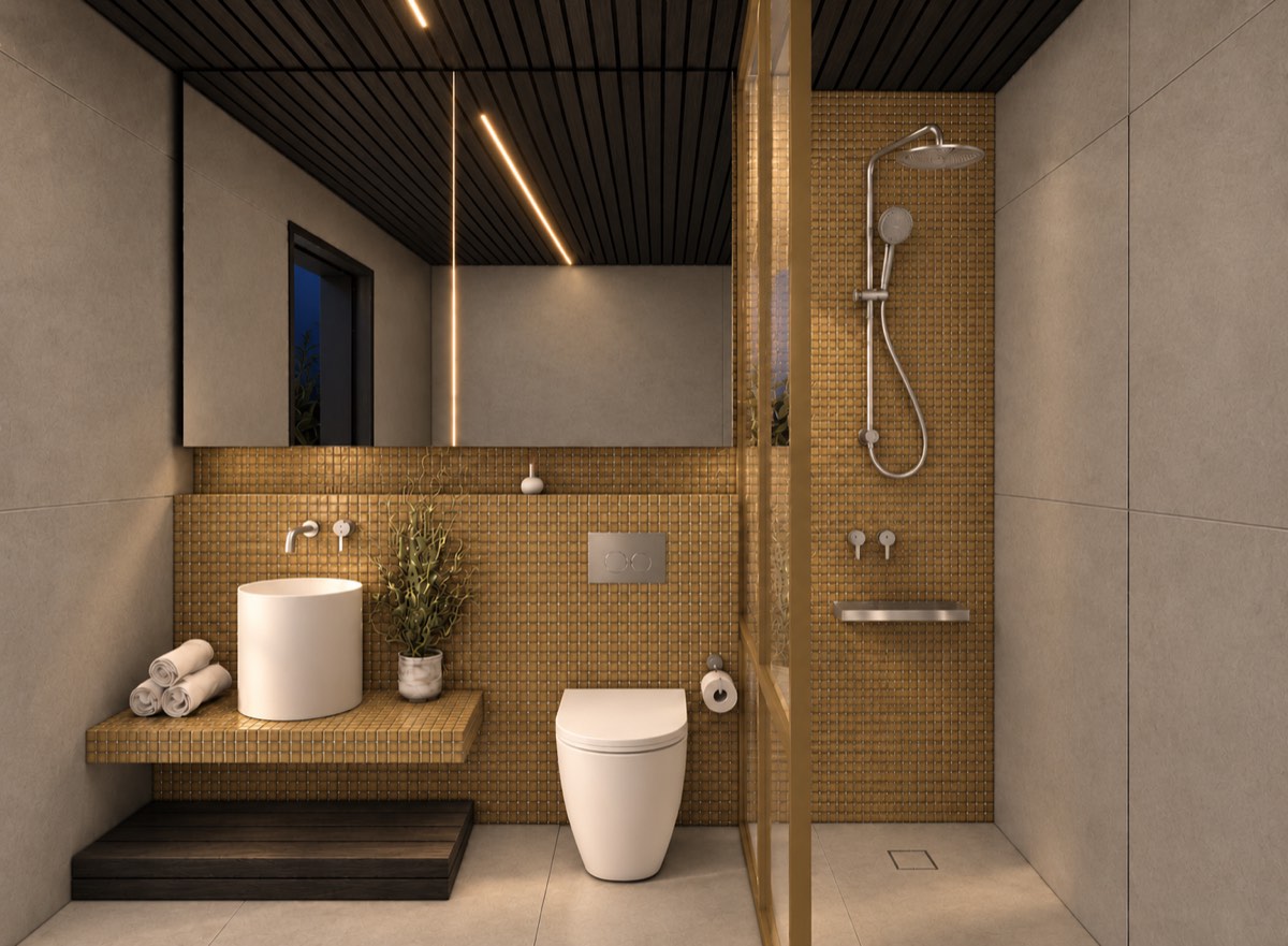 The bathroom of SOLUM Plus in Vine, with dark oak joinery, after dark