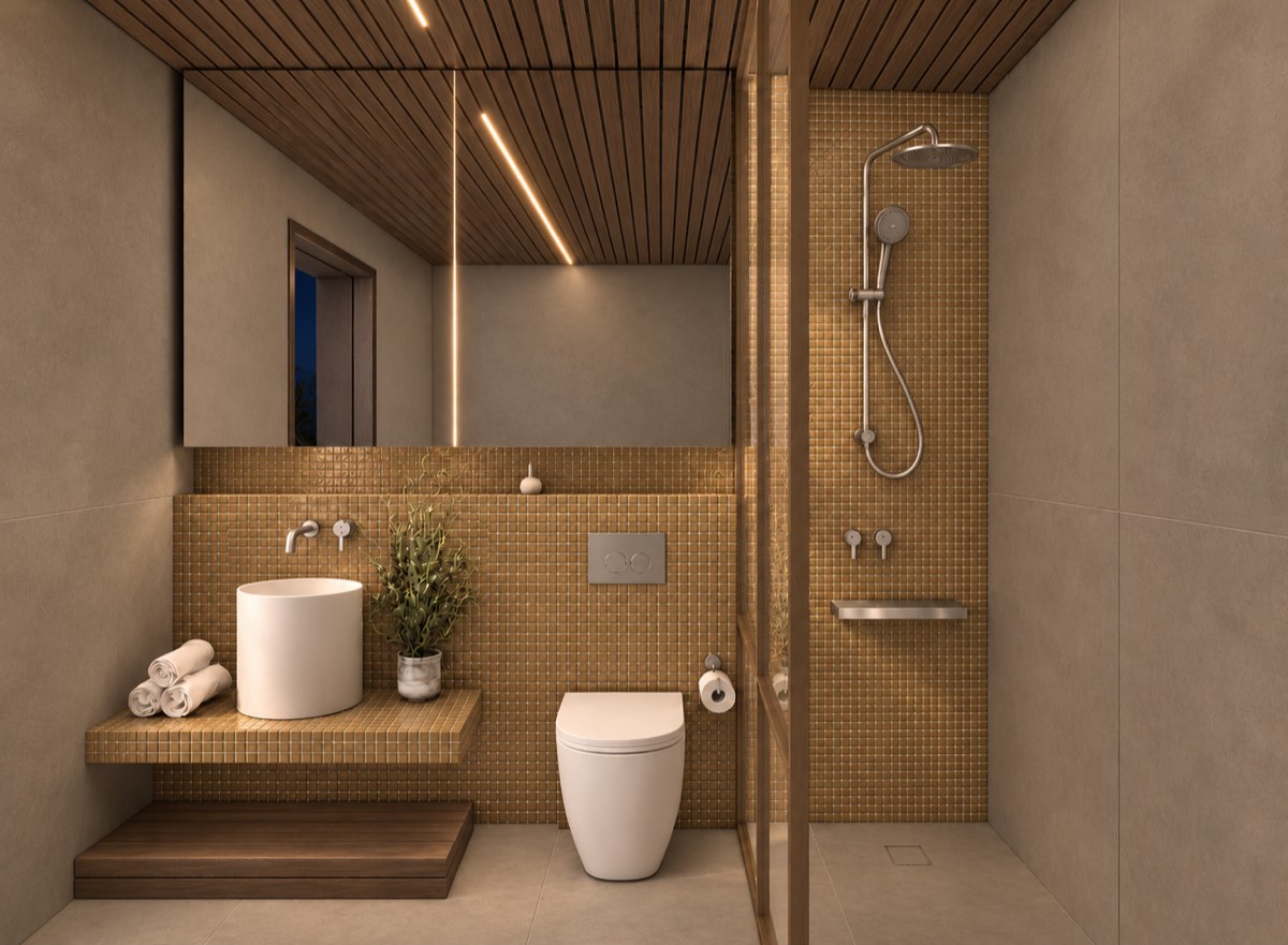 The bathroom of SOLUM Plus in Vine, with raw walnut joinery, after dark