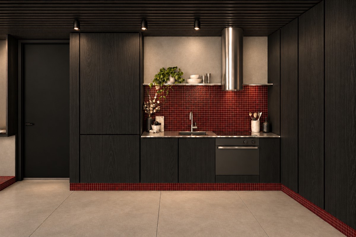 The kitchen of SOLUM Plus in Burgundy, with dark oak joinery, after dark