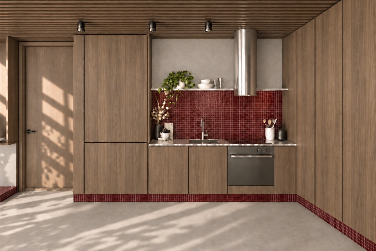 The kitchen of SOLUM Plus in Burgundy, with raw walnut joinery