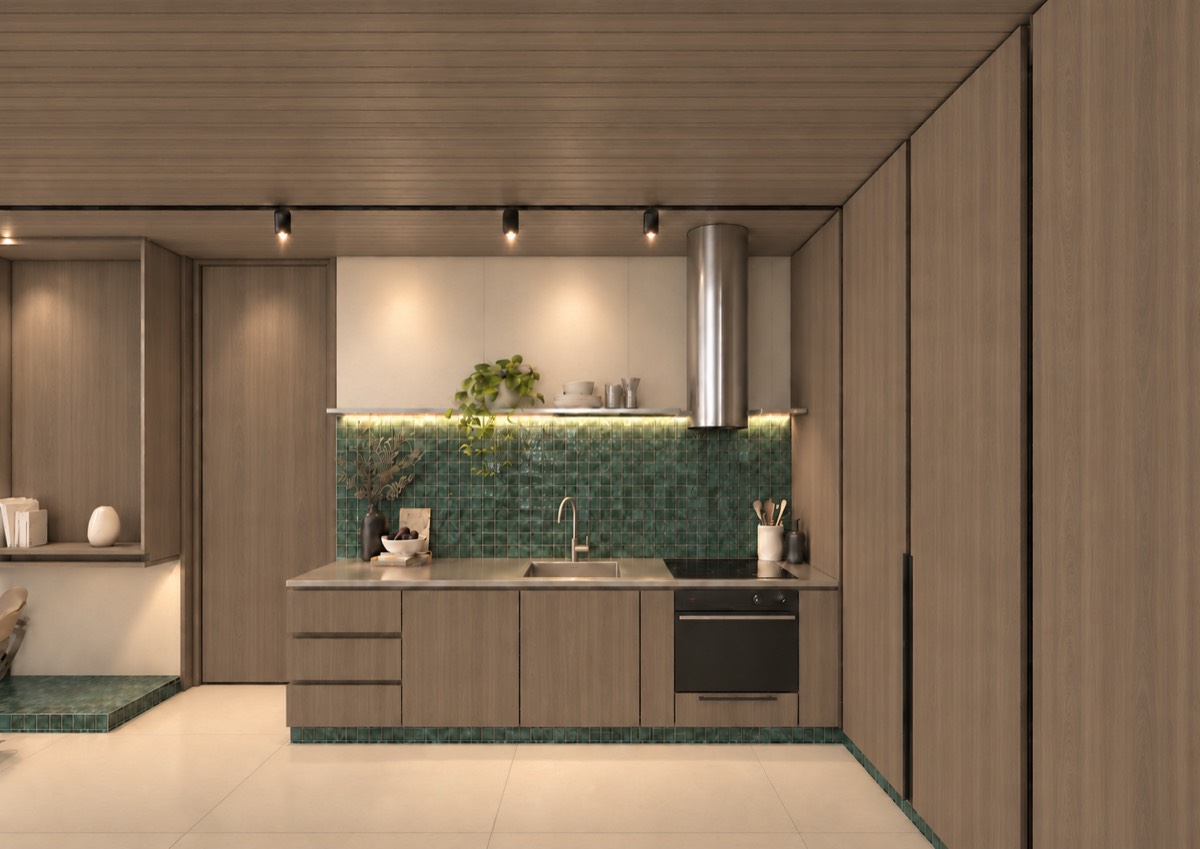 The kitchen of SOLUM Plus in Sage, with raw walnut joinery, after dark