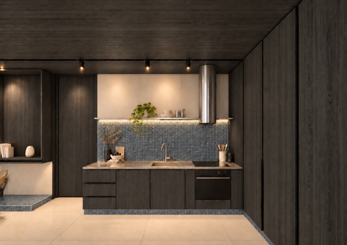 The kitchen of SOLUM Plus in Tide, with dark oak joinery, after dark