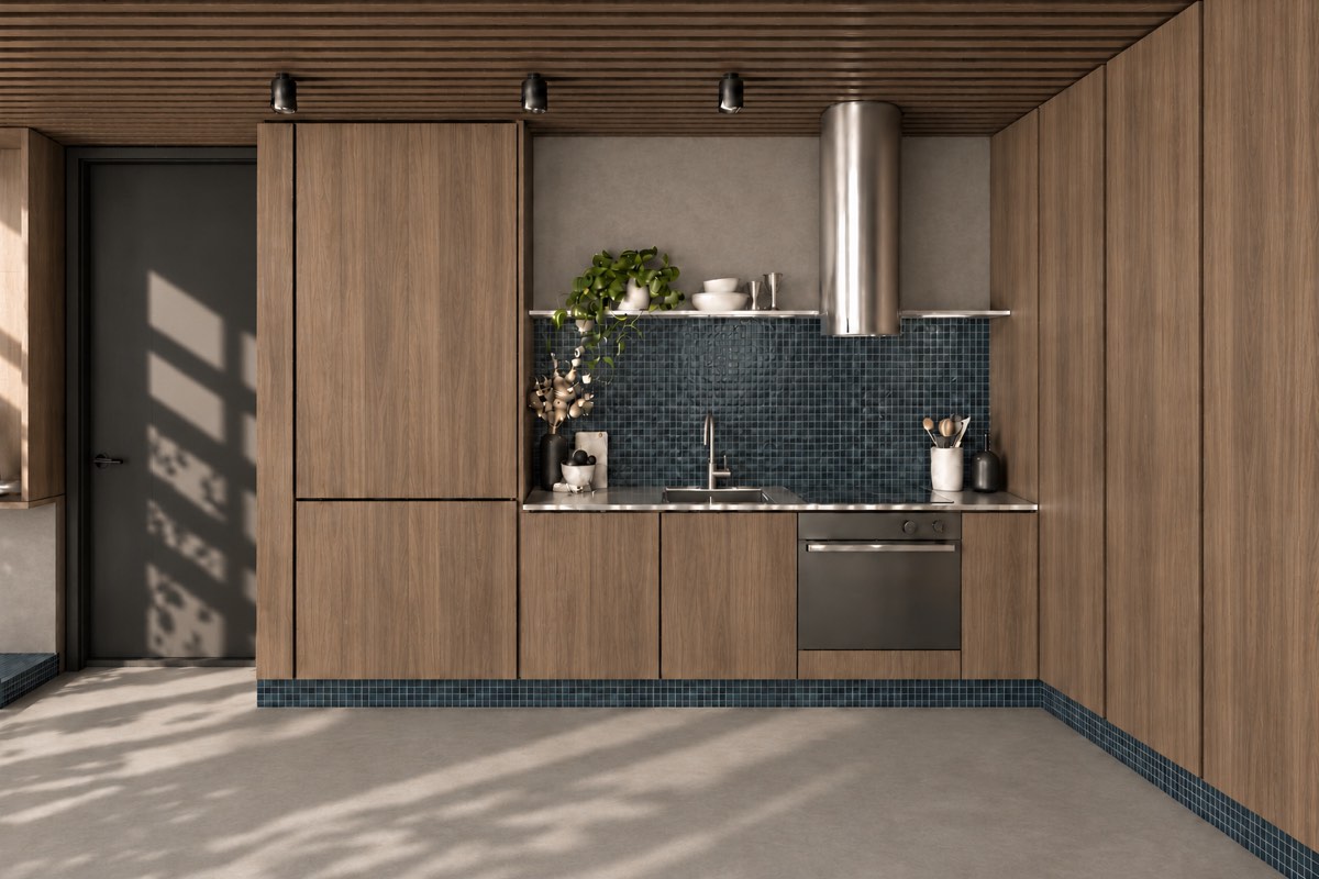The kitchen of SOLUM Plus in Tide, with raw walnut joinery