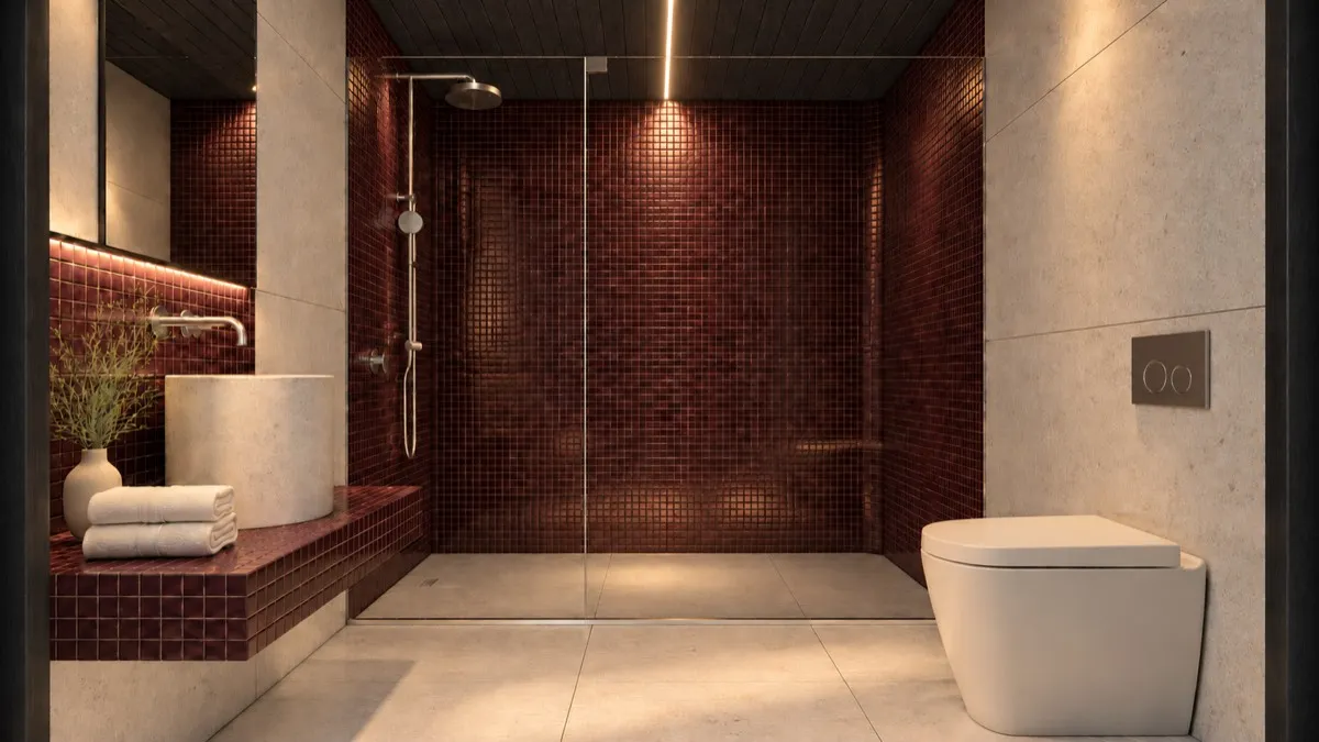 The bathroom of SOLUM Studio in Burgundy, with dark oak joinery, after dark