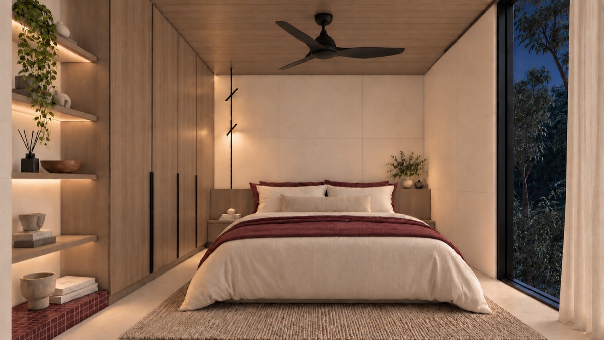 The bedroom of SOLUM Studio in Burgundy, with raw walnut joinery, after dark