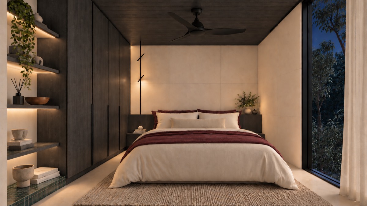 The bedroom of SOLUM Studio in Sage, with dark oak joinery, after dark