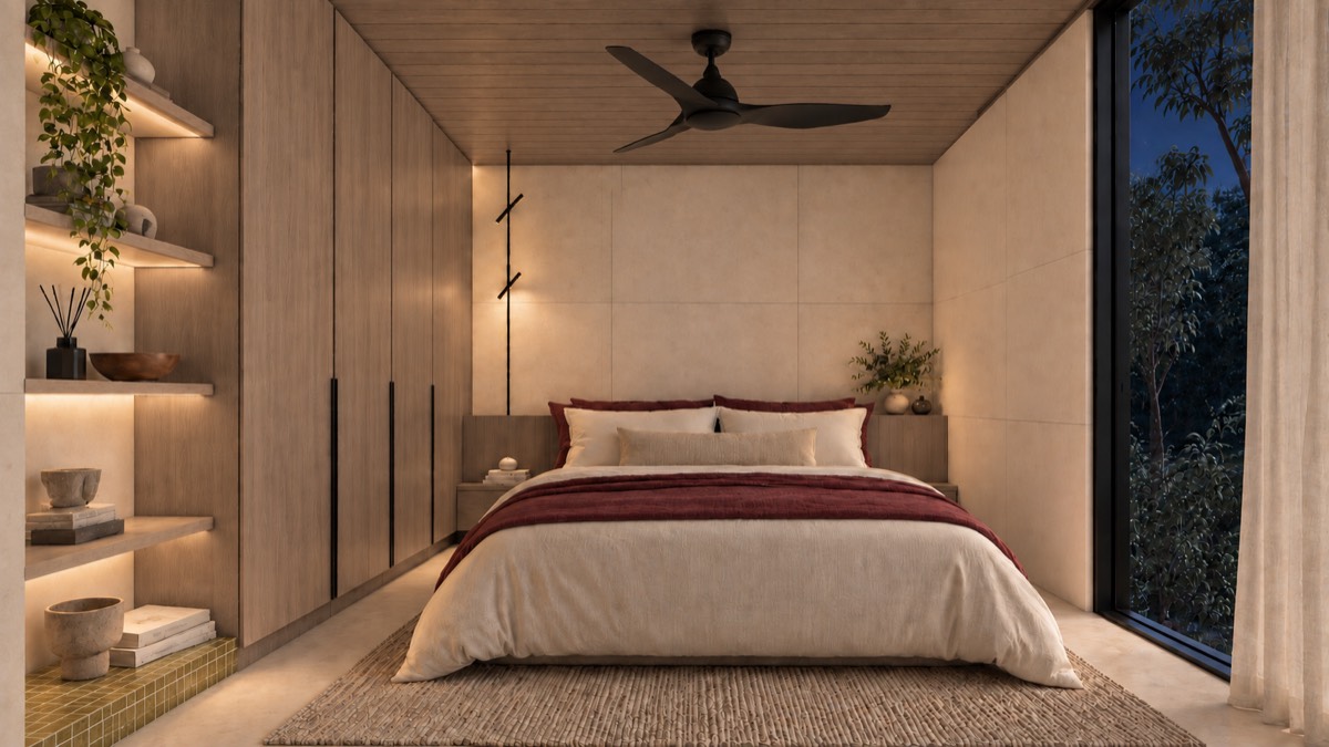 The bedroom of SOLUM Studio in Vine, with raw walnut joinery, after dark