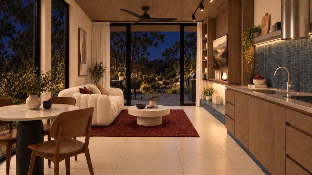 The living room of SOLUM Studio in Tide, with raw walnut joinery, after dark